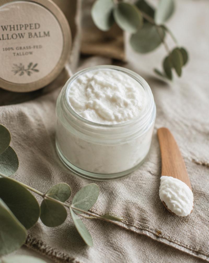 Tin of whipped tallow balm with wooden spatula
